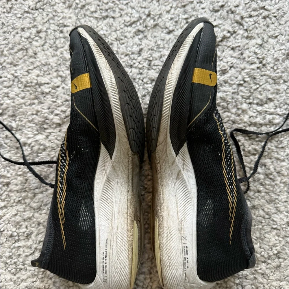 Men's Black and Gold Athletic Marathon Nike ZoomX Vaporfly size 11.5